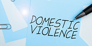 post it note that says Domestic Violence